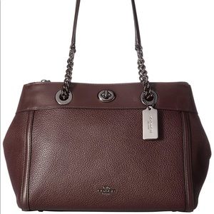 NWOT Coach Turnlock Edie Carryall in Mixed Leather